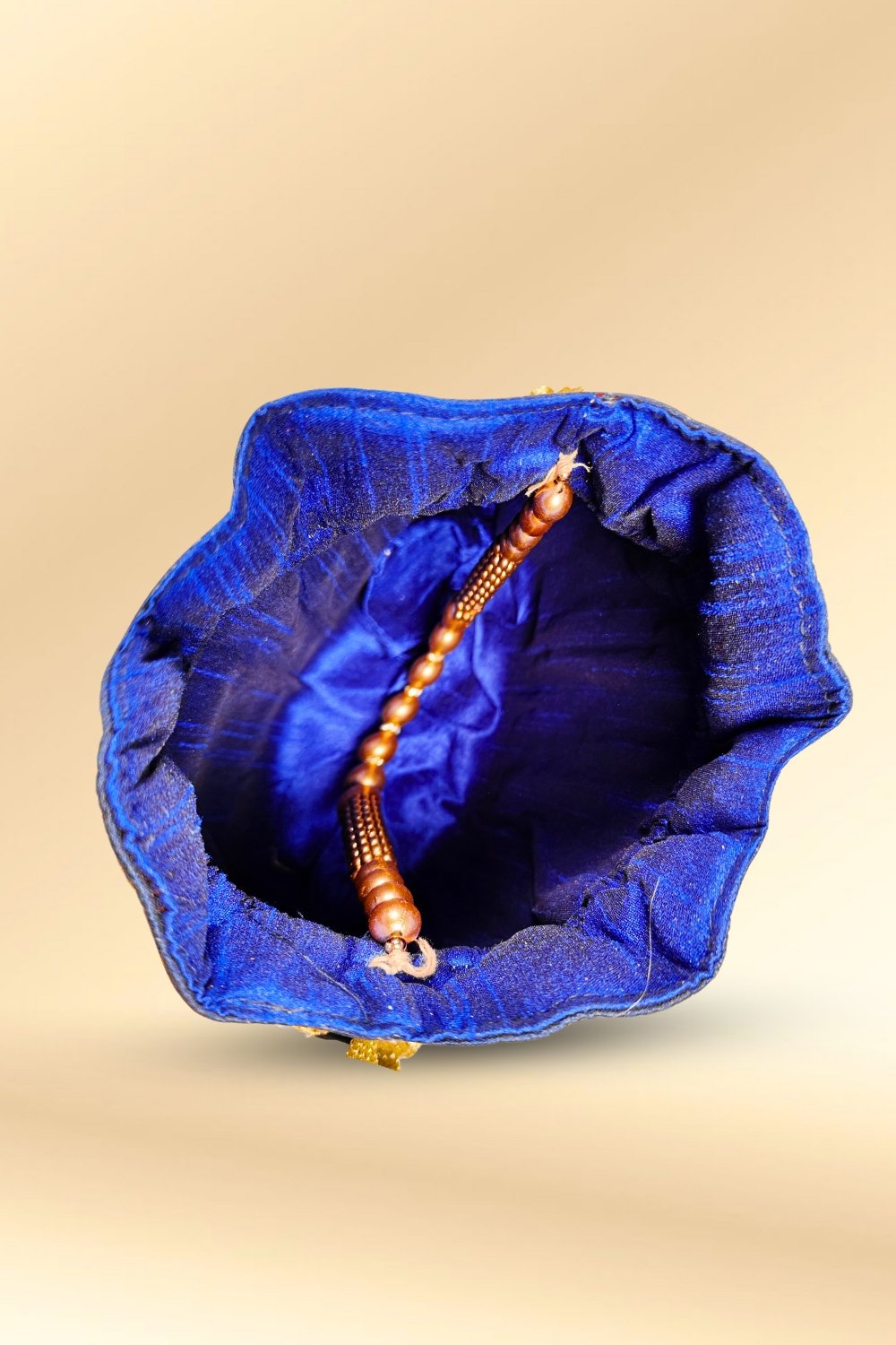 dark blue potli bag