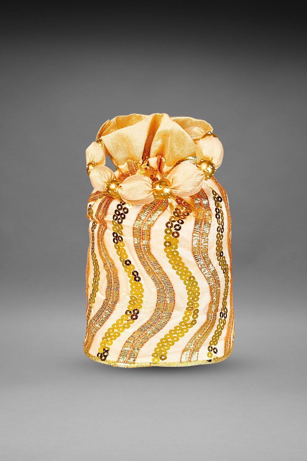 beige sequin potli bag