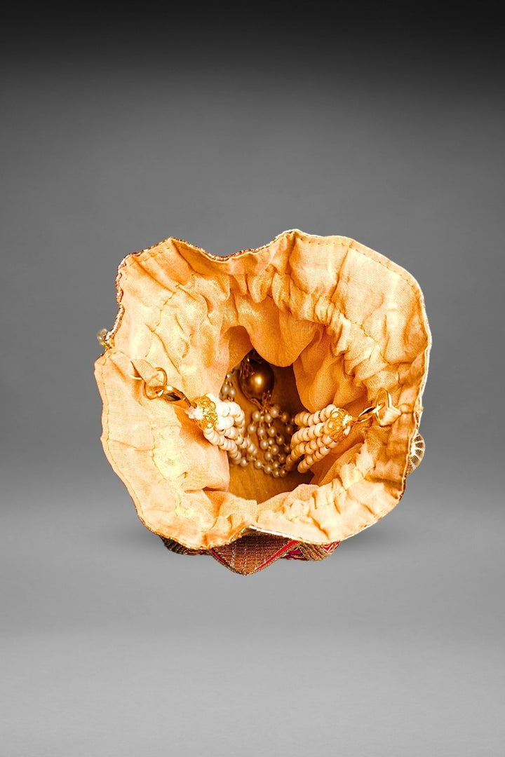 pink lotus potli bag