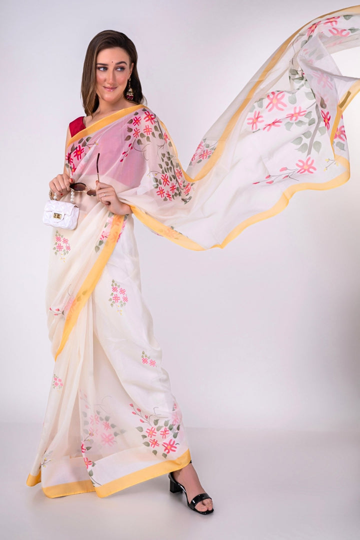 white saree with contrast blouse